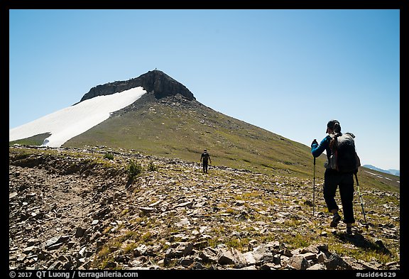 Hikers approaching Table Mountain off trail. Jedediah Smith Wilderness,  Caribou-Targhee National Forest, Idaho, USA (color)