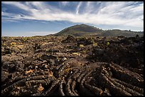 Pahoehoe lava and Big Cinder Butte. Craters of the Moon National Monument and Preserve, Idaho, USA ( color)