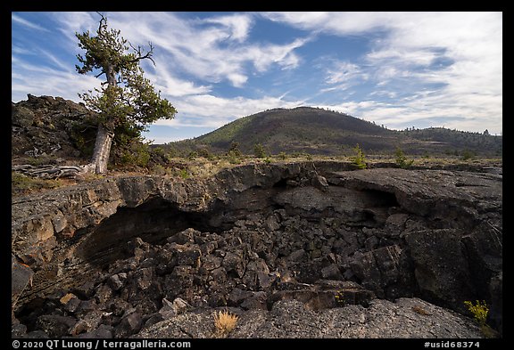 Buffalo Cave collpased roof and and Big Cinder Butte. Craters of the Moon National Monument and Preserve, Idaho, USA (color)