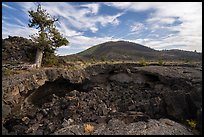 Buffalo Cave collpased roof and and Big Cinder Butte. Craters of the Moon National Monument and Preserve, Idaho, USA ( color)