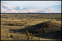 Snake River Plain with cinder cones and Pioneer Mountains. Craters of the Moon National Monument and Preserve, Idaho, USA ( color)