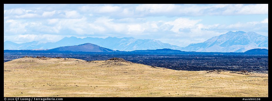 Craters of the Moon Lava Flow and Pioneer Mountains. Craters of the Moon National Monument and Preserve, Idaho, USA (color)