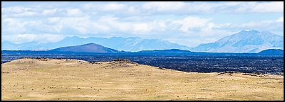 Craters of the Moon Lava Flow and Pioneer Mountains. Craters of the Moon National Monument and Preserve, Idaho, USA (Panoramic color)