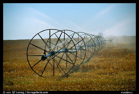 Irrigation wheels spraying water. Idaho, USA