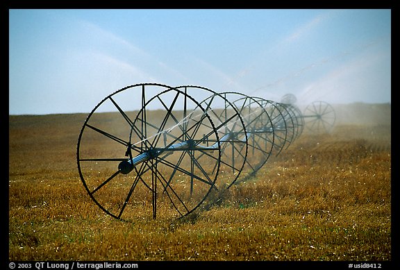 Irrigation wheels spraying water. Idaho, USA