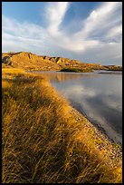 Grassy river shore and bluffs near Wood Bottom. Upper Missouri River Breaks National Monument, Montana, USA ( color)