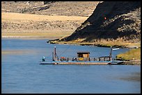 Operator fishing on McClelland Stafford Ferry. Upper Missouri River Breaks National Monument, Montana, USA ( color)