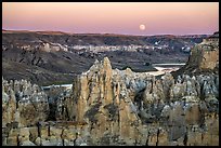Spires, Missouri River, and moon, Hole-in-the-Wall. Upper Missouri River Breaks National Monument, Montana, USA ( color)