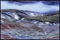 Painted hills with snow and fog. John Day Fossils Bed National Monument, Oregon, USA (color)