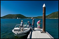 Family boarding boat, East Lake. Newberry Volcanic National Monument, Oregon, USA ( color)