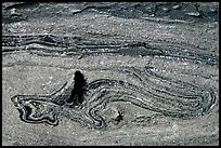 Incrustation pattern in obsidian glass close-up. Newberry Volcanic National Monument, Oregon, USA ( color)