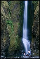 Men soaking at the base of Oneonta Falls. Columbia River Gorge, Oregon, USA ( color)