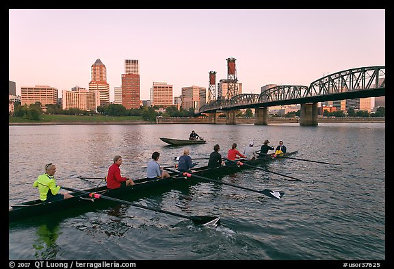 Eight-oar shell and city skyline at sunrise. Portland, Oregon, USA (color)