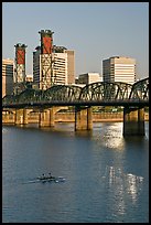 Double-oar rowboat and  Hawthorne Bridge. Portland, Oregon, USA (color)