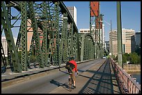 Bicyclist on Hawthorne Bridge. Portland, Oregon, USA ( color)