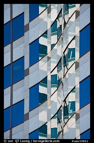 Pattern of windows and reflections in high rise building. Portland, Oregon, USA