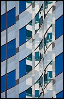 Pattern of windows and reflections in high rise building. Portland, Oregon, USA ( color)