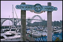 Newport marina and sign, foggy sunrise. Newport, Oregon, USA (color)