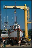 Fishing boats parked on deck, Port Orford. Oregon, USA (color)