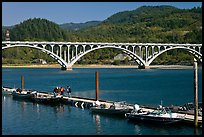 Small boat deck and Rogue River bridge. Oregon, USA