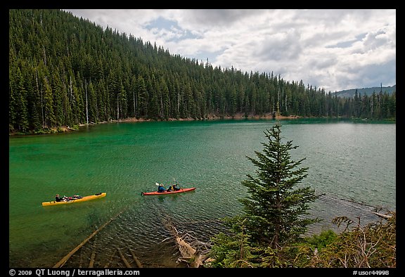 Kayaks on emerald waters, Devils Lake, Deschutes National Forest. Oregon, USA (color)