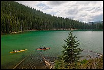 Kayaks on emerald waters, Devils Lake, Deschutes National Forest. Oregon, USA (color)