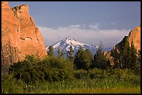 Snow-capped volcano seen between rock pinnacles. Smith Rock State Park, Oregon, USA (color)