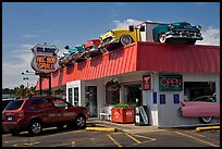 Dinner decorated with vintage cars, Florence. Oregon, USA (color)