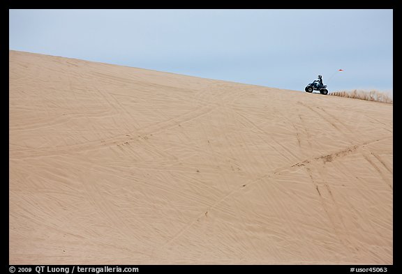 All terrain vehicle on dune crest, Oregon Dunes National Recreation Area. Oregon, USA (color)