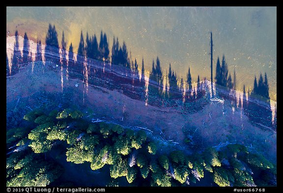 Aerial view of looking down Hyatt Lake shoreline with tree shadows. Cascade Siskiyou National Monument, Oregon, USA (color)