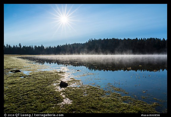 Sun and fog rising of Hyatt Lake. Cascade Siskiyou National Monument, Oregon, USA