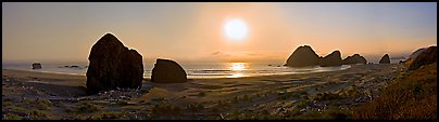 Pacific coastal scenery with setting sun, Pistol River State Park. Oregon, USA (Panoramic color)