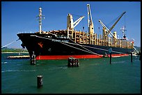 Cargo ship loading floated timber. Oregon, USA (color)