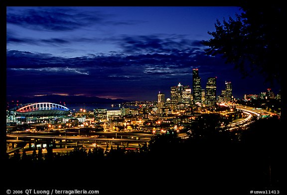 City skyline and Qwest Field at night. Seattle, Washington (color)