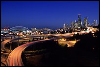 Seattle skyline, Qwest Field and freeways at dawn. Seattle, Washington (color)