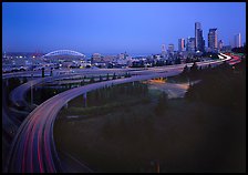 Freeway and skyline at dawn. USA ( color)