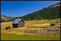 Barn and pasture in mountains. Washington