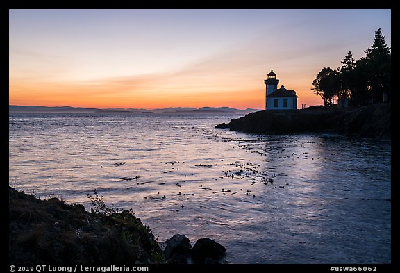 Lime Kiln Lighthouse at sunset, Lime Point State Park, San Juan Island. Washington (color)