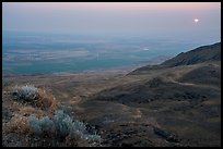 Sun rising in haze over Saddle Mountain, Hanford Reach National Monument. Washington ( color)