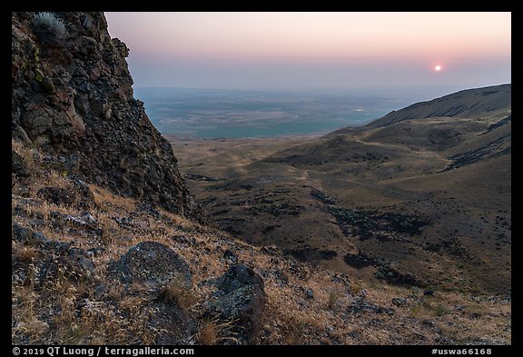 Volcanic outcrop and rising sun, Saddle Mountain, Hanford Reach National Monument. Washington (color)