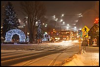 Street and town square with fresh snow by night. Jackson, Wyoming, USA