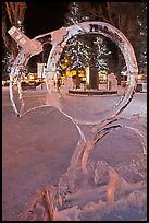 Town square statue framed by ice sculpture. Jackson, Wyoming, USA (color)