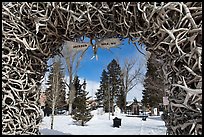 Town Square framed by Antler Arch in winter. Jackson, Wyoming, USA ( color)