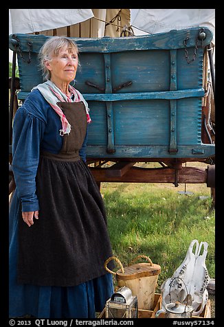 Woman with Pionneer wagon. Fort Laramie National Historical Site, Wyoming, USA (color)