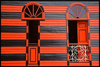 Red window shutters and striped walls, Parc De Bombas, Ponce. Puerto Rico (color)