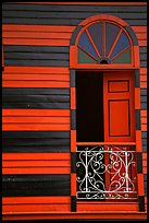 Window with red  shutters and striped walls,  Parc De Bombas, Ponce. Puerto Rico