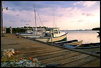 Pier and small boats at sunset, La Parguera. Puerto Rico