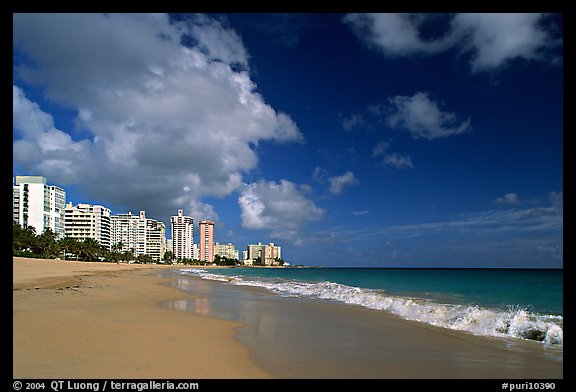 Beach and modern residential towers, morning. San Juan, Puerto Rico (color)