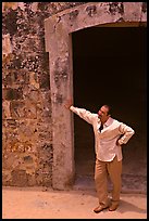 Man standing next to a doorway, El Morro Fortress. San Juan, Puerto Rico (color)