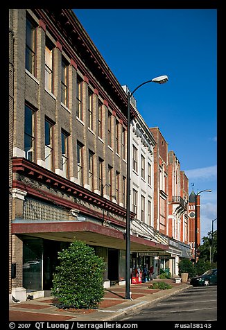 Sidewalk and historic downtown buildings. Selma, Alabama, USA